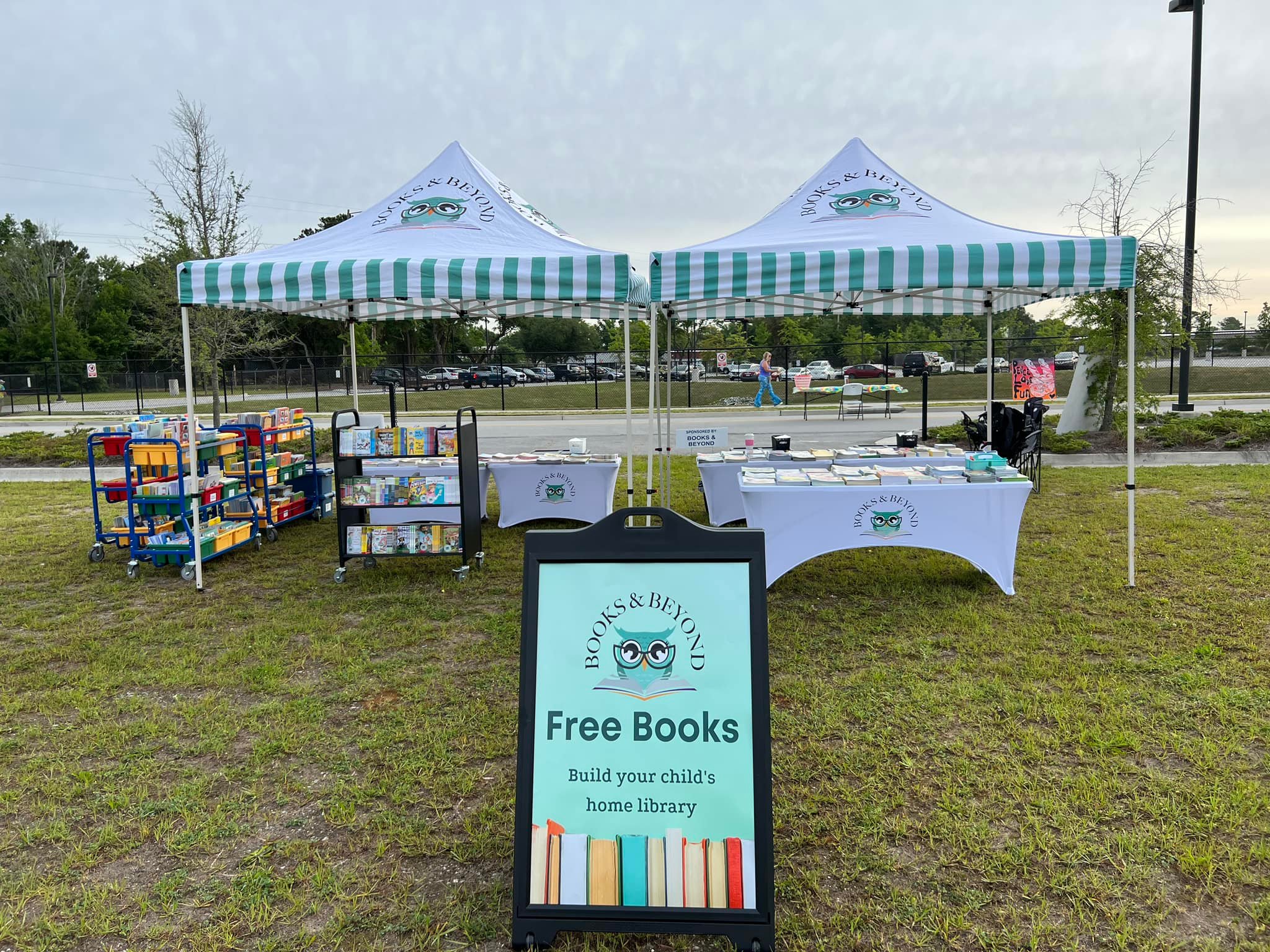Books & Beyond tents and free book displays at a community event